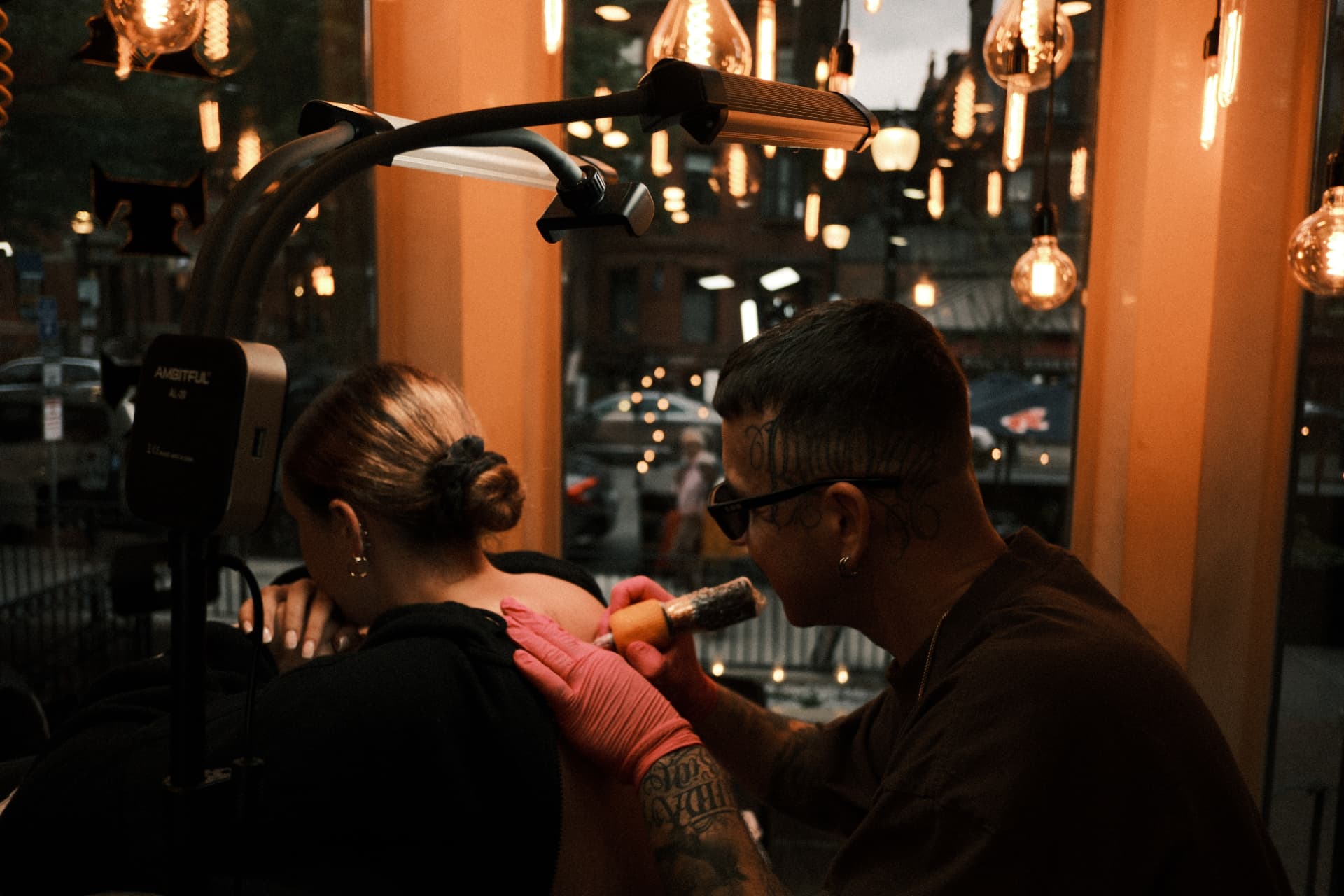 Abel tattooing a client at Boston Tattoo Company